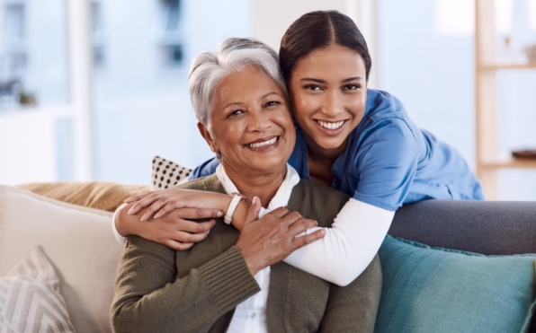 A dedicated caregiver providing compassionate care and unwavering support, enveloping a patient with a comforting and tender embrace.